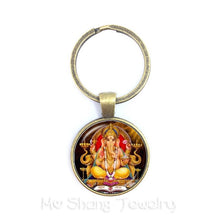 Load image into Gallery viewer, 2018 New Classic 25mm Ganesha Buddha Elephant Glass Dome Keychains Handmade Men Jewelry Car Key Holder Souvenir For Gift